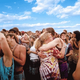 A herd of hippies grazes in a field near Burlington, VT.